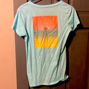 Roxy light blue medium t shirt with cool design on back.
